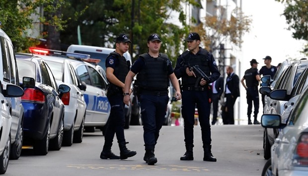 Riot police stand guard near the of Israeli Embassy in Ankara, Turkey