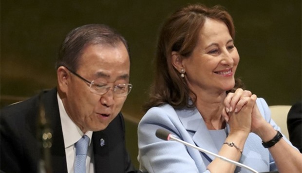 French Minister for Environment Segolene Royal sits with UN Secretary General Ban Ki-moon
