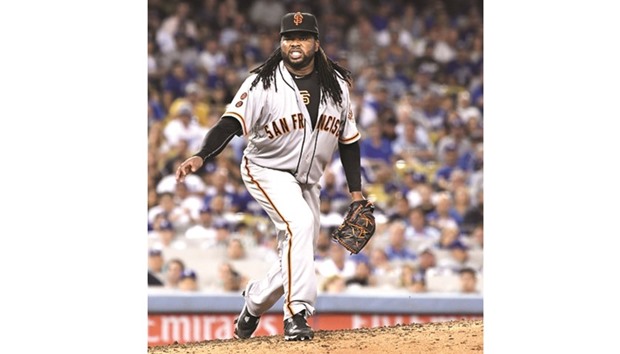 San Francisco Giants pitcher Johnny Cueto grimaces in pain after a pitch against the Los Angeles Dodgers in the sixth inning in Los Angeles. (Los Angeles Times/TNS)