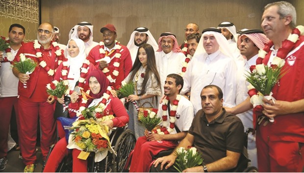 Qataru2019s contingent that travelled to the 2016 Paralympics in Rio de Janeiro team greeted on their arrival in Doha recently. Team Qatar returned with a successful haul of two silver medals. PIC: Jayan Orma