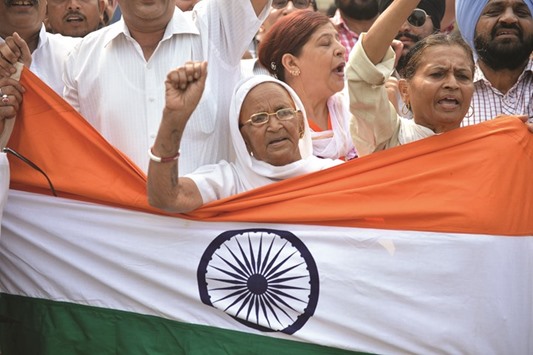 Activists from the Congress Party shout anti-Pakistan slogans during a protest in Jammu yesterday.
