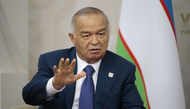 Uzbekistanu2019s President Islam Karimov gesturing during a meeting with his Russian counterpart in Ufa ahead of the start of the Shanghai Cooperation Organization (SCO) summit on July 10, 2015. AFP