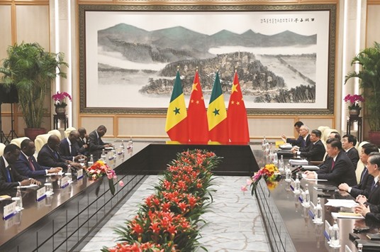 Chinese President Xi Jinping (3rd from right) and Senegalese President Macky Sall (2nd from left) during their meeting at the West lake State Guest House in Hangzhou, Zhejiang province, yesterday. Wedged in between the Brexit vote and the US presidential election, leaders of the worldu2019s major economies meet this weekend in China requiring to mount a realistic defence of the free trade and globalisation they have long championed.