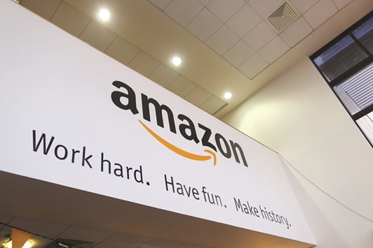 A sign hangs at the reception of Amazon.com centre in Hemel Hempstead, the UK. Seeking feedback from Twitchu2019s highly engaged audience of 10mn daily users, Amazon has streamed two original TV-show pilots produced by its own studios on the gaming website.