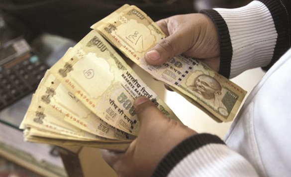 The Indian rupee climbed 0.5%, its biggest gain since May 25, to 66.665 per dollar, prices from local banks compiled by Bloomberg show.