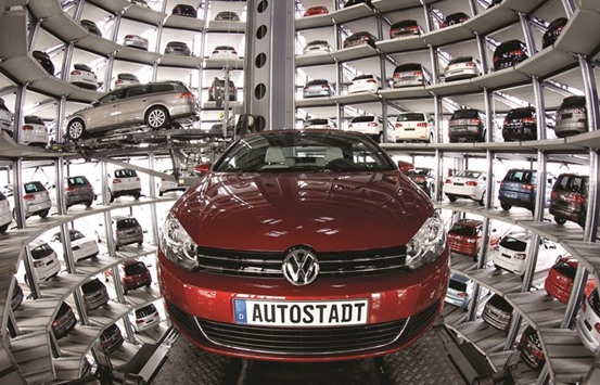 New Volkswagen models Golf Cabriolet and Passat are stored at the u2018CarTowersu2019 in the theme park u2018Autostadtu2019 next to the company plant in Wolfsburg, Germany. VW will carry out an u2018EU-wide action planu2019 to inform customers and repair the vehicles, EU Justice and Consumer Affairs Commissioner Vera Jourova said after meeting with Francisco Javier Garcia Sanz, VWu2019s top negotiator for diesel issues, in Brussels on Wednesday.