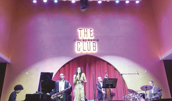 Judi Jackson performs with the band at The Club, The St. Regis Doha, on Wednesday night. Photo by Anand Holla
