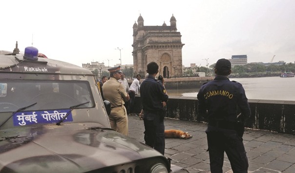 Security was beefed up in Mumbai yesterday after a high alert was sounded in Maharashtra following reports of suspicious gun toting masked persons being sighted in Uran, a nearby coastal town.