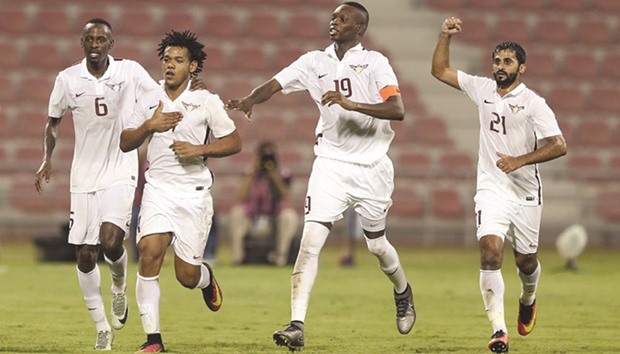 El Jaishu2019s Romarinho (second from left) celebrates after scoring the winning goal for his side against Al Arabi yesterday.