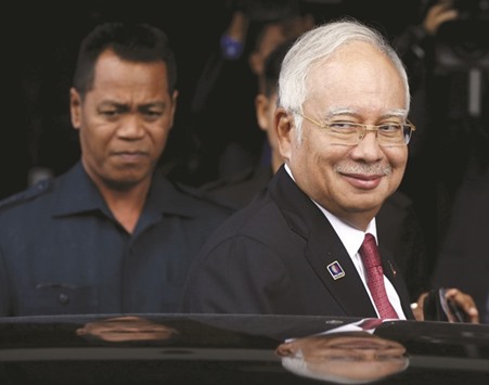Najib: has shut down Malaysian investigations, clamped down on media reporting of the affair, and purged critics from his ruling party.
