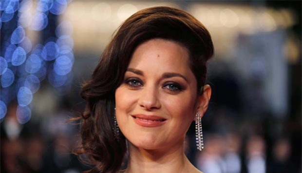 Marion Cotillard poses at the 69th Cannes Film Festival in May this year.