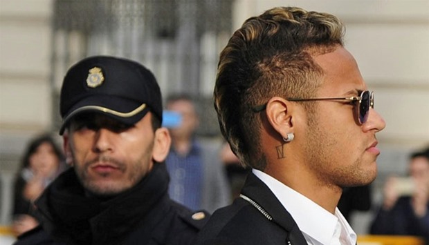 Barcelona's Brazilian forward Neymar arriving to Spain's National Court in Madrid on February 2, 2016