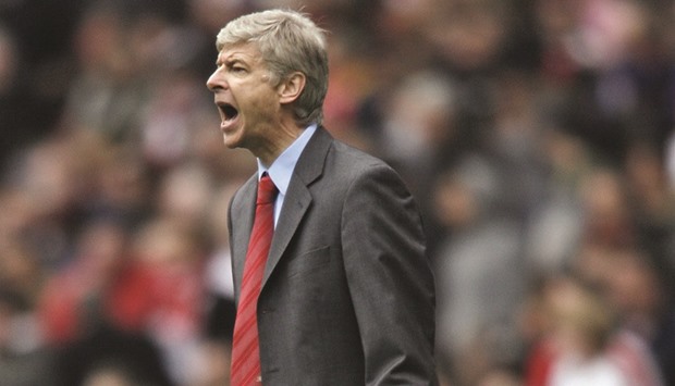 This file photo taken on April 5, 2008 shows Arsenalu2019s French manager Arsene Wenger reacting during their Premiership match against Liverpool.