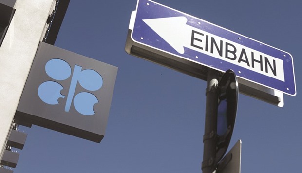 The Opec logo is seen at its headquarters in Vienna, Austria. More than 800,000 bpd of additional crude is pouring into the global market this month compared with August as Russia pumps at an all-time high while Libya and Nigeria restore disrupted supplies, according to statements from their ministry officials. That would imply a tripling of the supply surplus, estimated currently at about 400,000 bpd by the International Energy Agency.