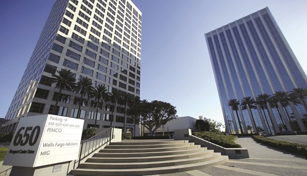 Pacific Investment Management Co office (left) is seen in California. Global bond yields will rise modestly and spikes in volatility could be more commonplace in the coming years as loose central bank policy loses its potency, according to Pimco.