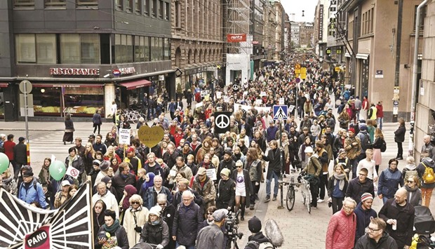 Participants march to protest racism and fascism in Helsinki yesterday.