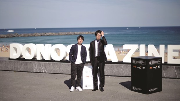 Japanese director Makoto Shinkai (left) and producer Genki Kawamura take part in a photocall to promote the animated film Your Name at the San Sebastian Film Festival yesterday.
