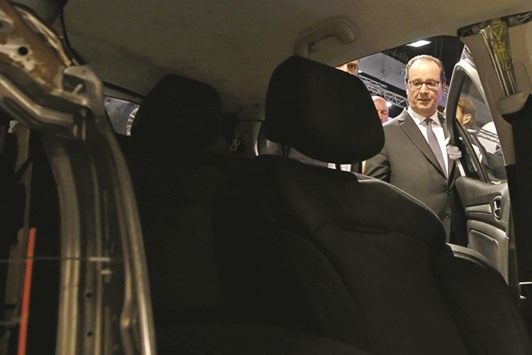 Hollande is seen during a visit to the national firefightersu2019 congress in Tours, France.