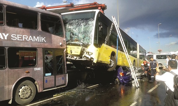 The damaged metrobus is seen as rescue officials look for people at the site of Fridayu2019s incident in Istanbul.