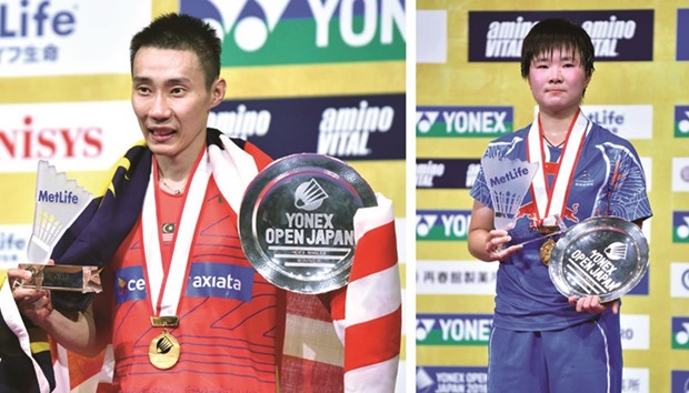 Lee Chong Wei of Malaysia celebrates during the awards ceremony after his victory in the menu2019s singles final against Jan O Jorgensen of Denmark at the Japan Open in Tokyo yesterday.   He Bingjiao of China celebrates during the awards ceremony after her victory against compatriot Sun Yu in the womenu2019s singles final at the Japan Open in Tokyo yesterday. (AFP)