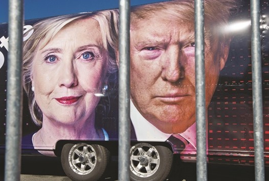 Images of Hillary Clinton and Donald Trump on a CNN vehicle at Hofstra University, in Hempsted, New York. The university is the site of the first Presidential debate today.