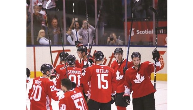 Team Canada celebrate their semi-final victory over Team Russia in the 2016 World Cup of Hockey at the Air Canada Centre on Saturday.