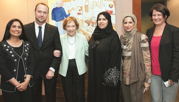 The journalists with former US First Lady Rosalynn Carter and a WISH official.