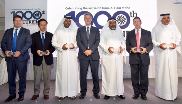 Officials and dignitaries celebrate at an event in Doha the arrival of Siemensu2019 1,000th gas turbine at the Umm Al Houl Combined Cycle Power Plant in Qatar. PICTURE: Noushad Thekkayil