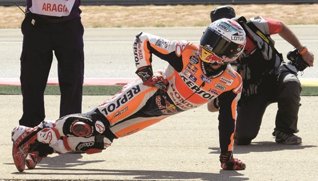Repsol Honda Teamu2019s Spanish rider Marc Marquez celebrates after winning the Moto GP race of the Aragon Grand Prix at the Motorland racetrack in Alcaniz yesterday.