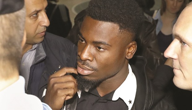 Paris Saint-Germainu2019s defender Serge Aurier at a courthouse in Paris to answer a charge of elbowing a police officer. (AFP)