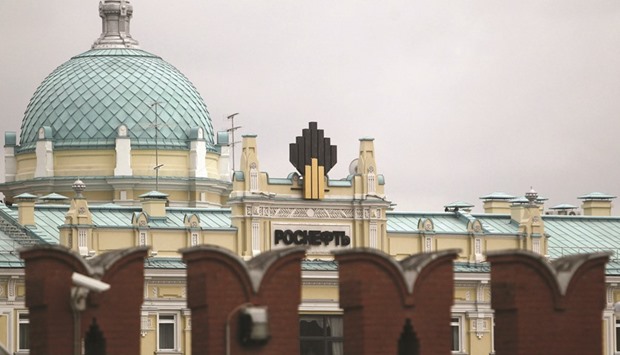 Rosneft headquarters is seen behind the Kremlin wall in central Moscow. Rosneft expects the share of hard-to-recover oil production to rise to 11% of its total crude output by 2020, from 7% this year.