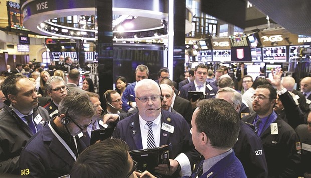 Traders work on the floor of the New York Stock Exchange. S&P 500 profits are poised to fall a sixth straight time this quarter, according to analystsu2019 estimates compiled by Bloomberg.