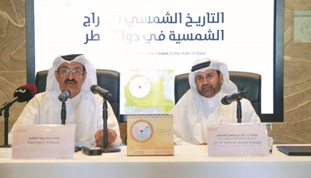 Dr Khalid bin Ibrahim al-Sulaiti and Engineer Essa S R al-Kuwari explaining the details of the u2018solar calendaru2019 at the Katara presentation yesterday.