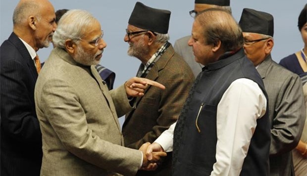 Indian Prime Minister Narendra Modi is seen with Pakistan's Prime Minister Nawaz Sharif  at the 18th SAARC summit in Kathmandu in this file photo taken on November 27, 2014.
