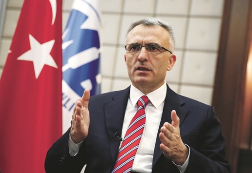 Turkeyu2019s Finance Minister Naci Agbal speaks during an interview with Reuters in Ankara on Tuesday. He forecast that the $720bn economy would pick up again in 2017 and took a sanguine view of the rating agencyu2019s downgrade, saying the issues it raised were already on the governmentu2019s agenda.