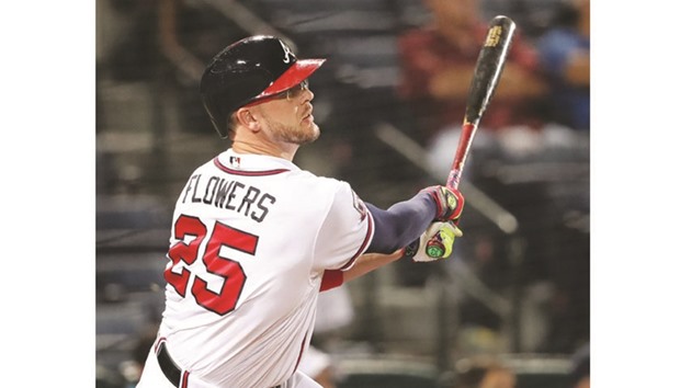 Tyler Flowers hits a three-run home run against the Philadelphia Phillies during the sixth inning in Atlanta on Tuesday.