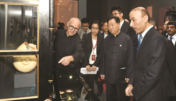 Dignitaries touring the exhibition after its opening at the National Museum of China in Beijing.