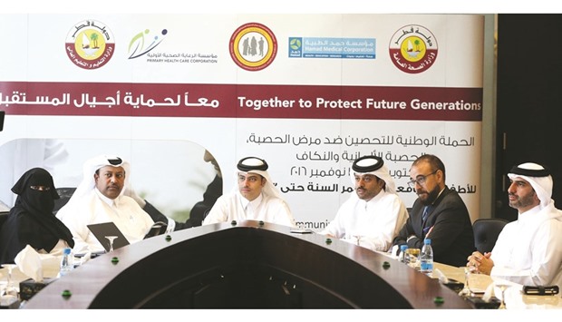 Sheikh Dr Mohamed bin Hamad al-Thani, centre, and Dr Hamad Eid al-Rumaihi, third right, with officials of other organisations at the press conference. PICTURE: Jayan Orma