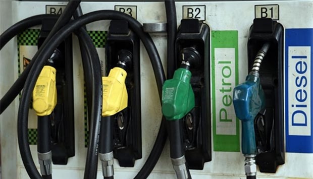 Fuel pumps are pictured at a service station in New Delhi on Thursday.