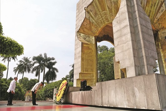 President Rodrigo Duterte attends a wreath-laying ceremony at the Monument of National Heroes and Martyrs in Hanoi yesterday.