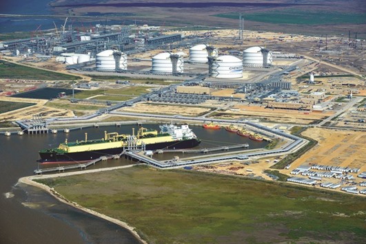 An LNG carrier is docked at the Cheniere Energy terminal in this aerial photograph taken over Sabine Pass, Texas, US, on February 24, 2016. Thanks to a global glut that depressed prices, Cheniere Energy Inc has sent more than half of the LNG tankers from its Sabine Pass terminal in Louisiana to South America.