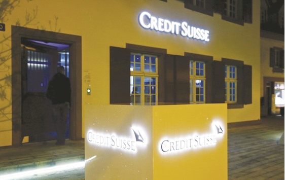 The logo of Credit Suisse is seen in front of a branch in Riehen, Switzerland. Credit Suisse Group expects the Middle East to account for a significant part of its growth in private banking as the number of super wealthy individuals in the region increases.