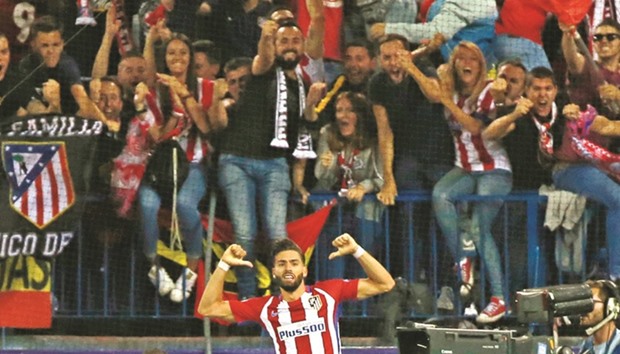 Atletico Madridu2019s Yannick Carrasco celebrates after scoring a goal in the Champions League against Bayer Munich in Vicente Calderon, Madrid on Wednesday night. (Reuters)