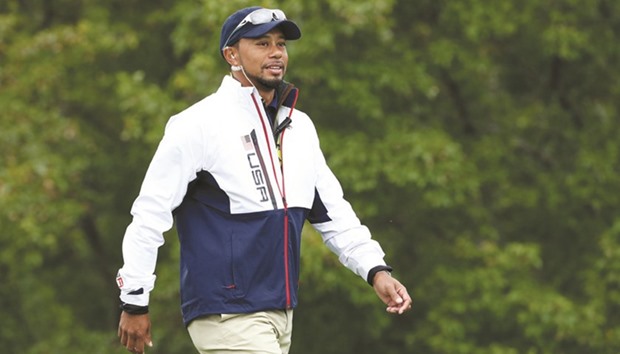 Team USA vice-captain Tiger Woods walks the 10th green during the practice round for the Ryder Cup at Hazeltine National Golf Club yesterday.