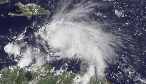 NOAA GOES East satellite visible image released September 30, 2016 shows Hurricane Matthew in the Caribbean Sea at 1845 UTC on September 29, 2016
