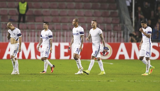 Players of Inter Milan react after losing their UEFA Europa League Group K match against Sparta Praha at the Generali Arena in Prague, Czech Republic.