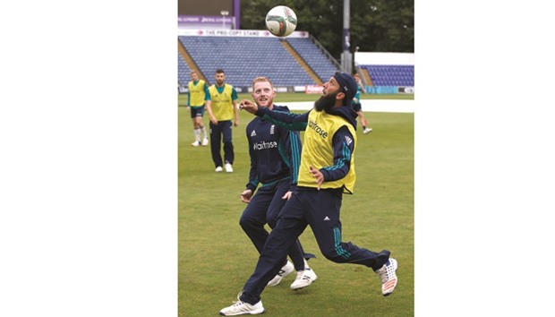 Englandu2019s Moeen Ali (right) and Ben Stokes play football during a training session in Cardiff yesterday. (Reuters)