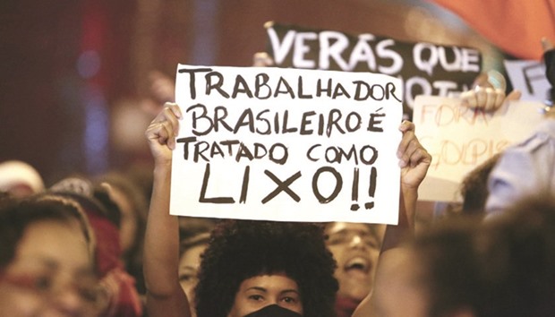 Supporters of former president Dilma Rousseff demonstrate in Sao Paulo on Friday night.