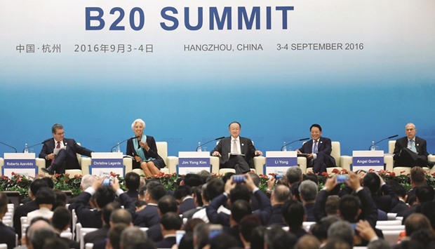 Director-general of the World Trade Organisation Roberto Azevedo, managing director of the International Monetary Fund Christine Legarde, president of the World Bank Jim Yong Kim, director general of the United Nations Industrial Development Organisation Li Yong, and secretary-general of the Organisation for Economic Co-operation and Development Jose Gurria, attend a session during the B20 Summit ahead of G-20 Summit, in Hangzhou, China yesterday.