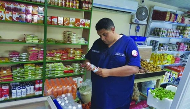 An official during an inspection at the supermarket.